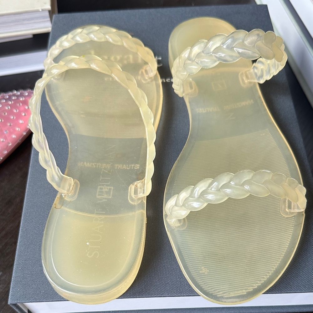 Stuart Weitzman Braida Jelly Sandals in neutral color.